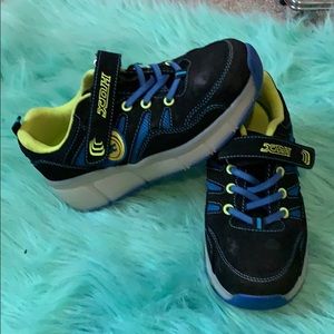 XDH roller shoes - black, blue and neon green